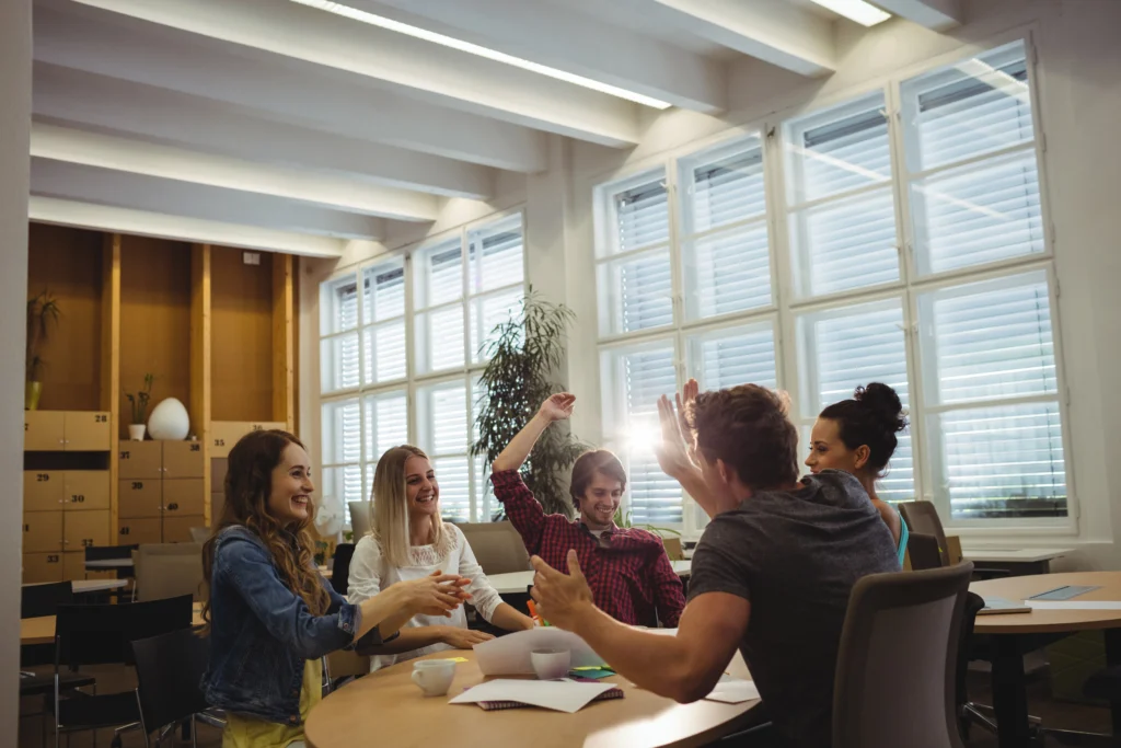 group business executives giving high five 1