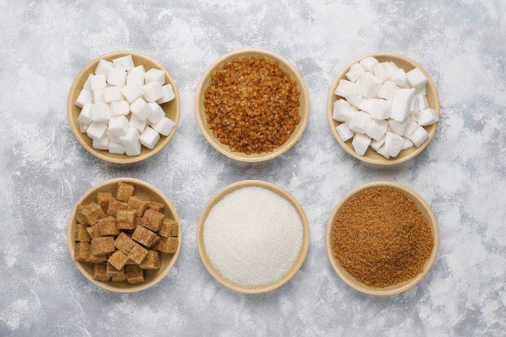 various types sugar brown sugar white concrete top view 2